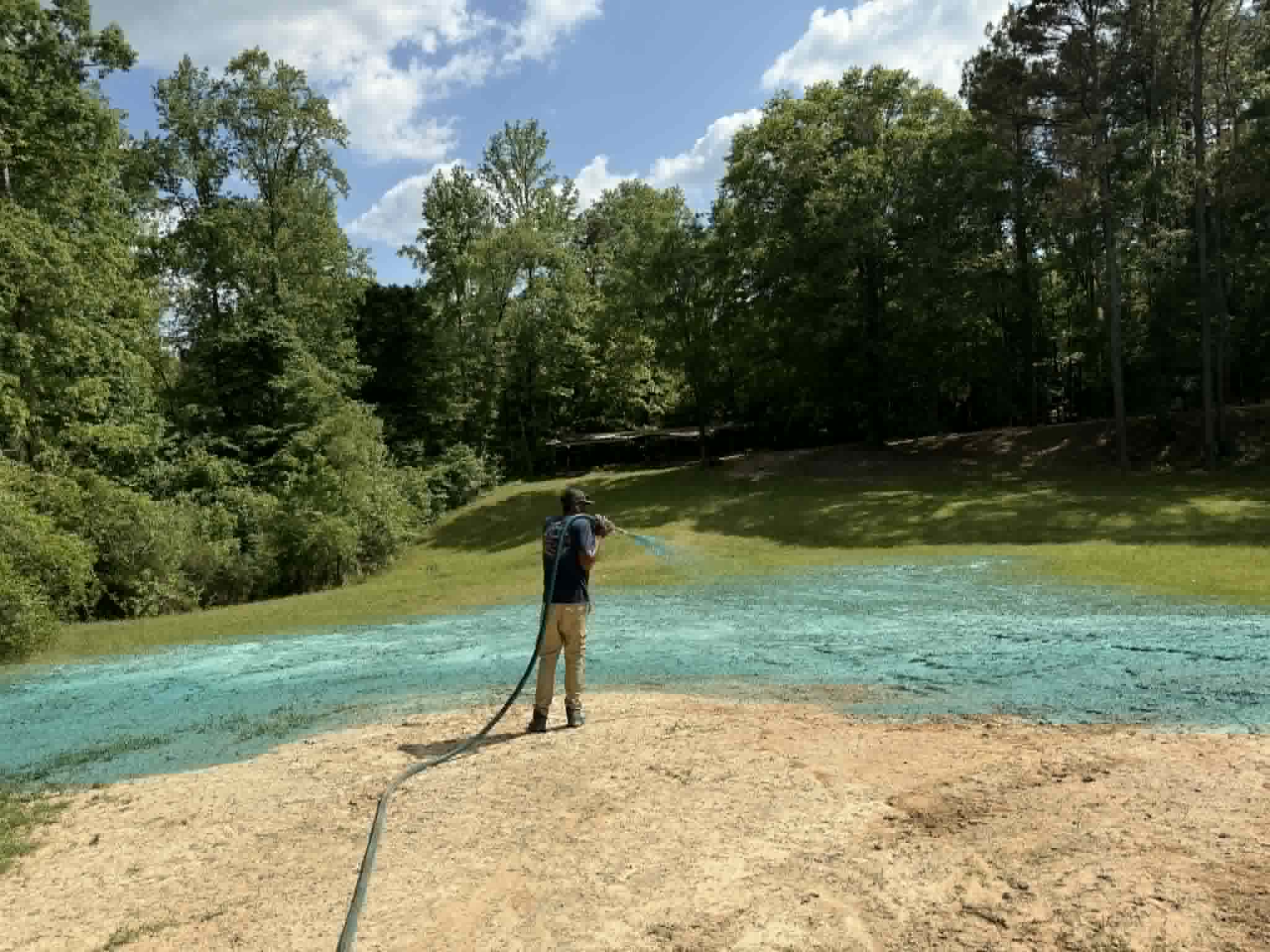 Professional hydro seeding application on a freshly prepared lawn in Meridian, Mississippi